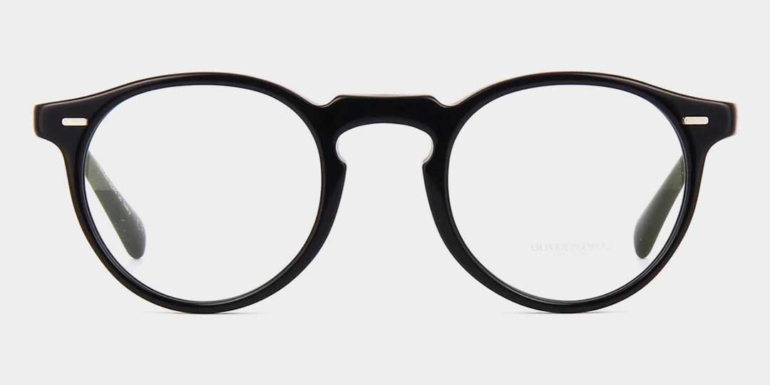 Round black eyeglasses frame with silver staple rivet details