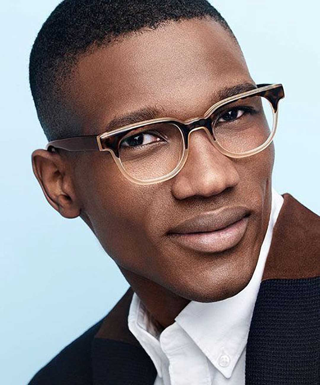 Smartly dressed man wearing two tone gradient spectacles frame