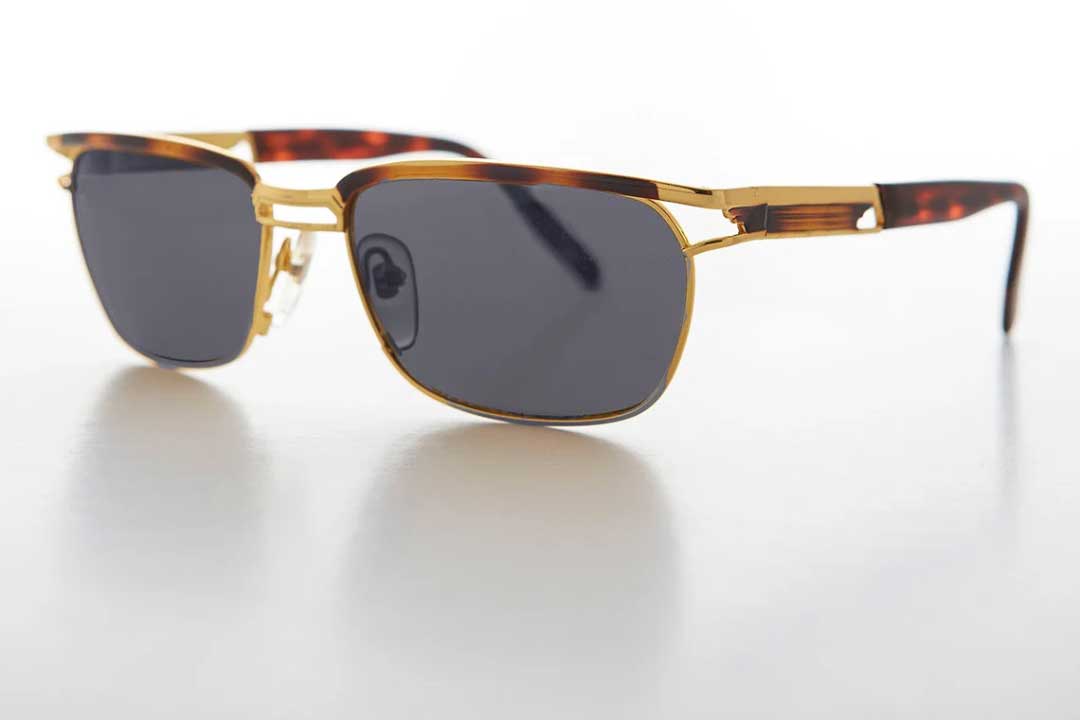 Three quarter view of NOS Walker tortoise and gold sunglasses with green tinted lenses