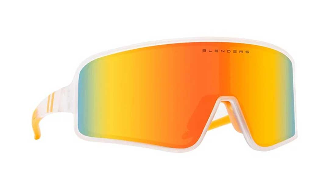 Three quarter view of skiing sunglasses frame with bright orange mirror visor lens
