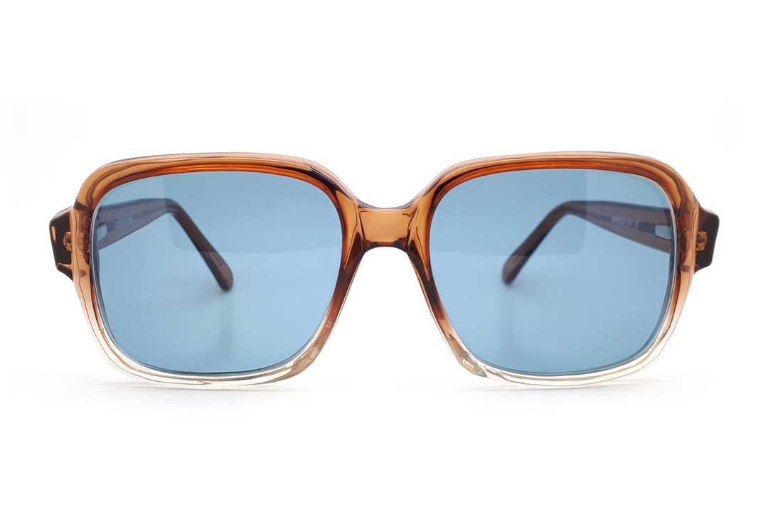 Women's brown to clear gradient crystal acetate sunglasses frame with blue tinted lenses