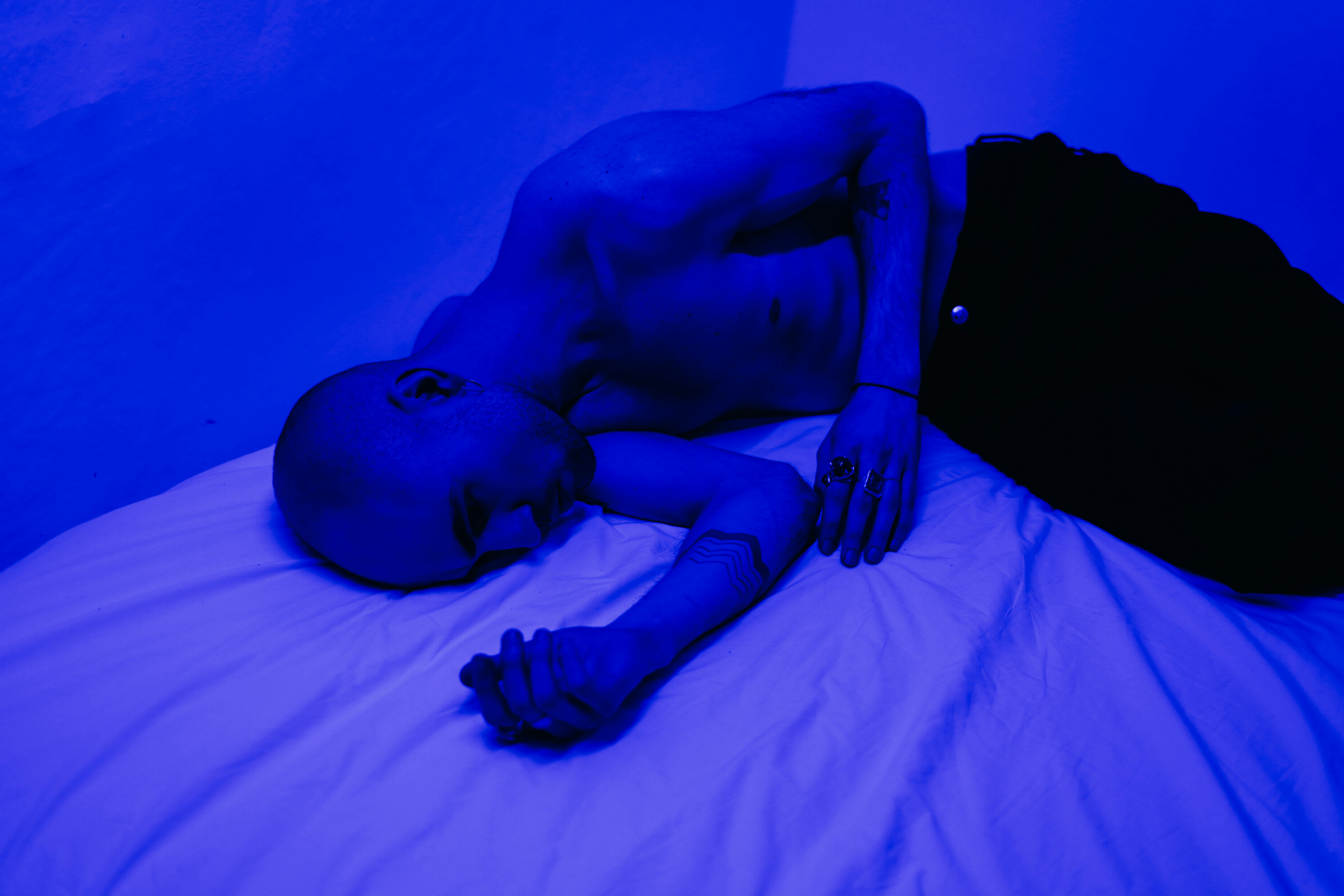 Man Lying on Bed