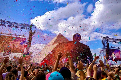 Glastonbury Festival with confetti streaming through the air