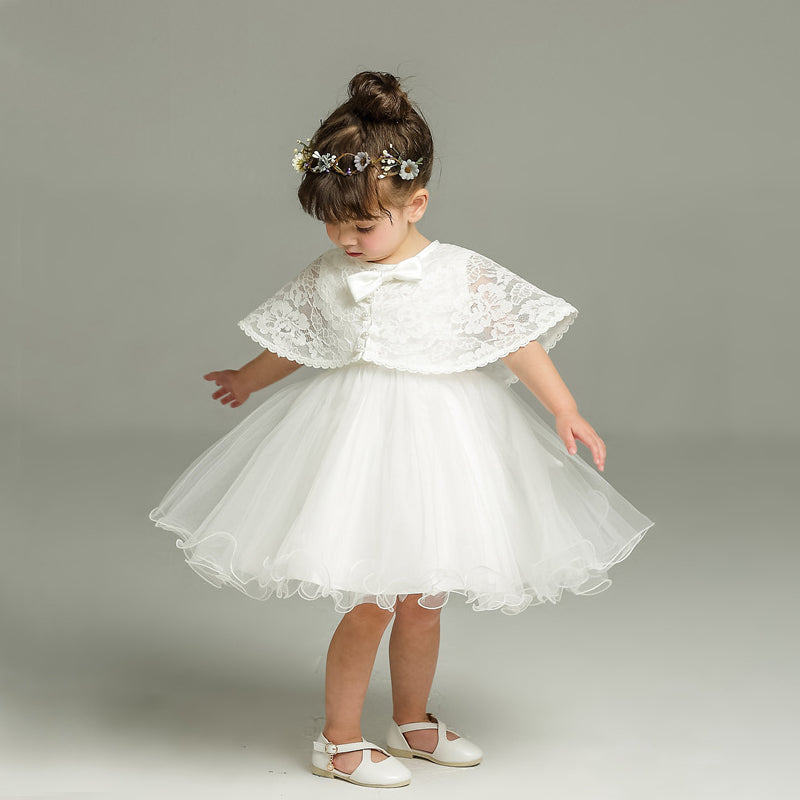 baby girl with white dress