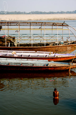 Ganges bather in the Ganges river in Varanasi, India (Photo: CP Travels)