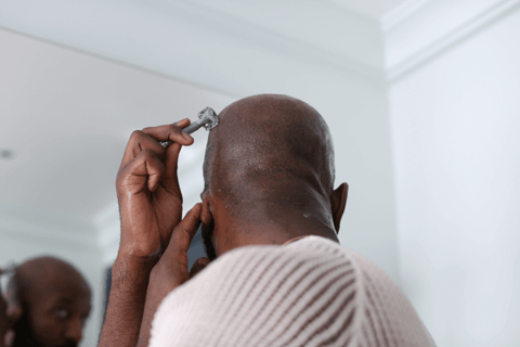 how to shave your head shave with the contours of your head with long slow strokes