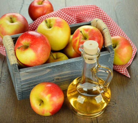 maçãs e vinagre de cidra da maçã, ingredientes todo-naturais rosto exfoliators
