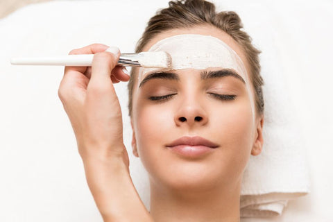 woman having a facial mask on her t-zone