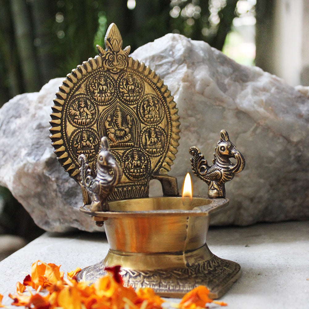 Traditional Ashtalakshmi Vilakku Divine Brass Oil Lamp With Peacocks Theindianweave