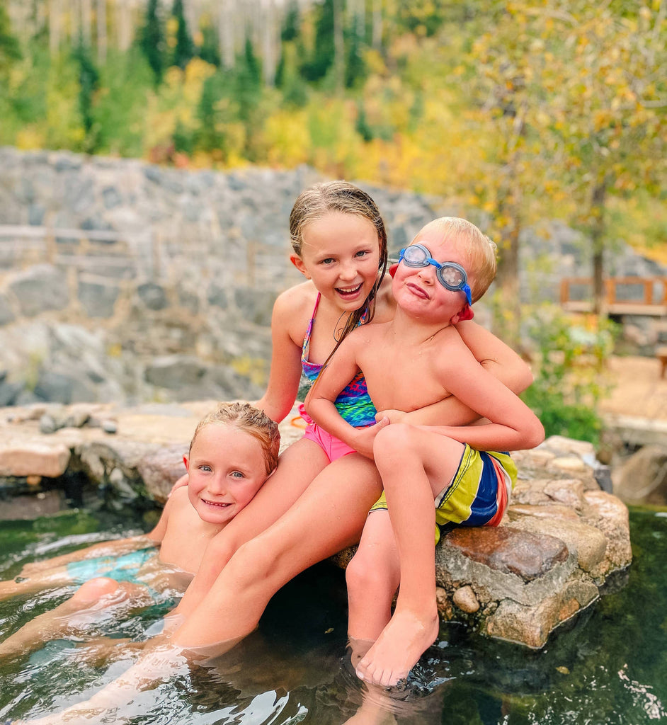 The anderson kids in a hot spring - ateamfamilyadventures