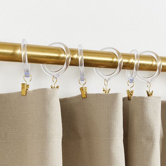 Flat fold curtains and drapery clips