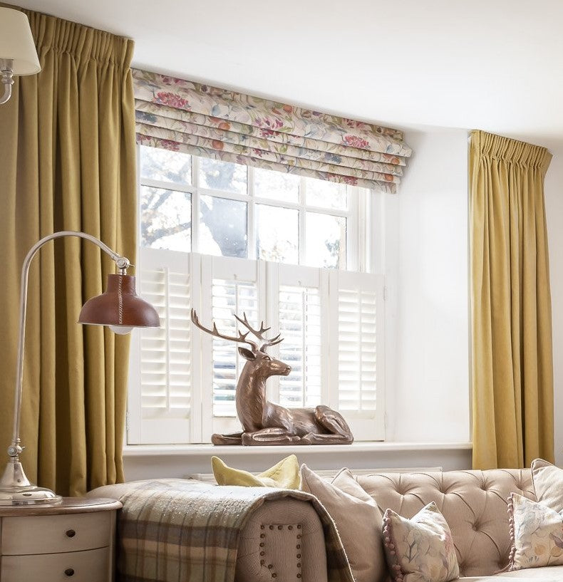 Pinch pleat curtains in country home