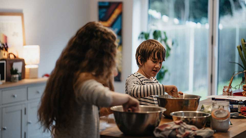 Kids baking cookies and cooking together