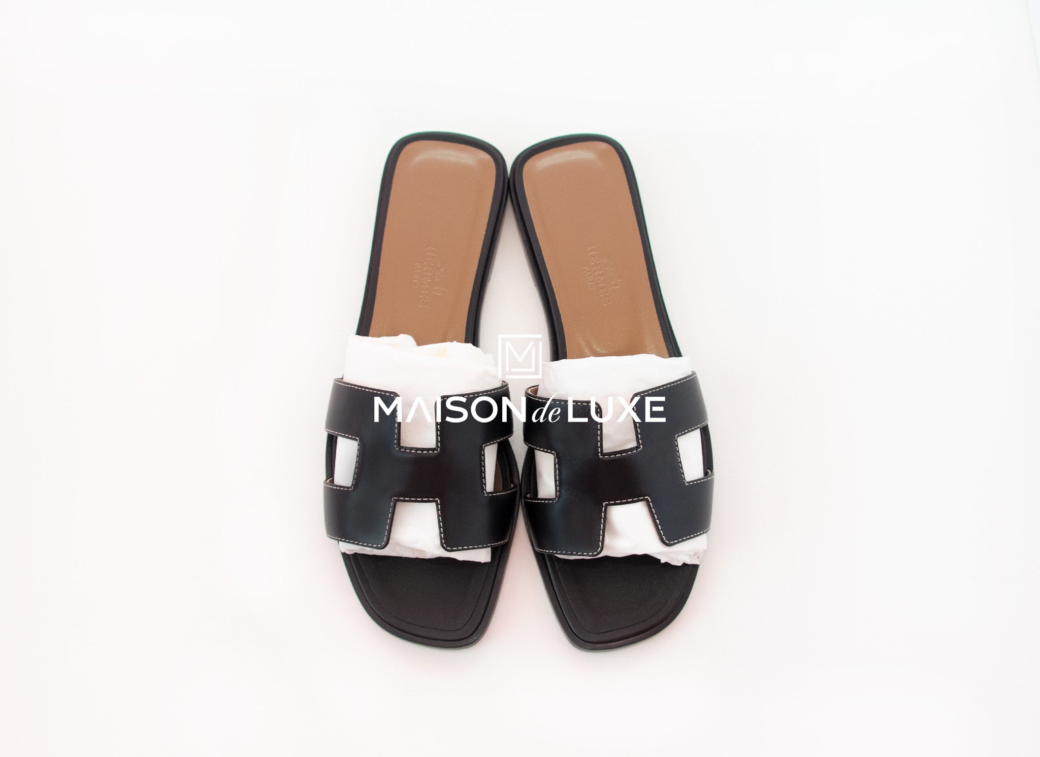 black hermes slippers