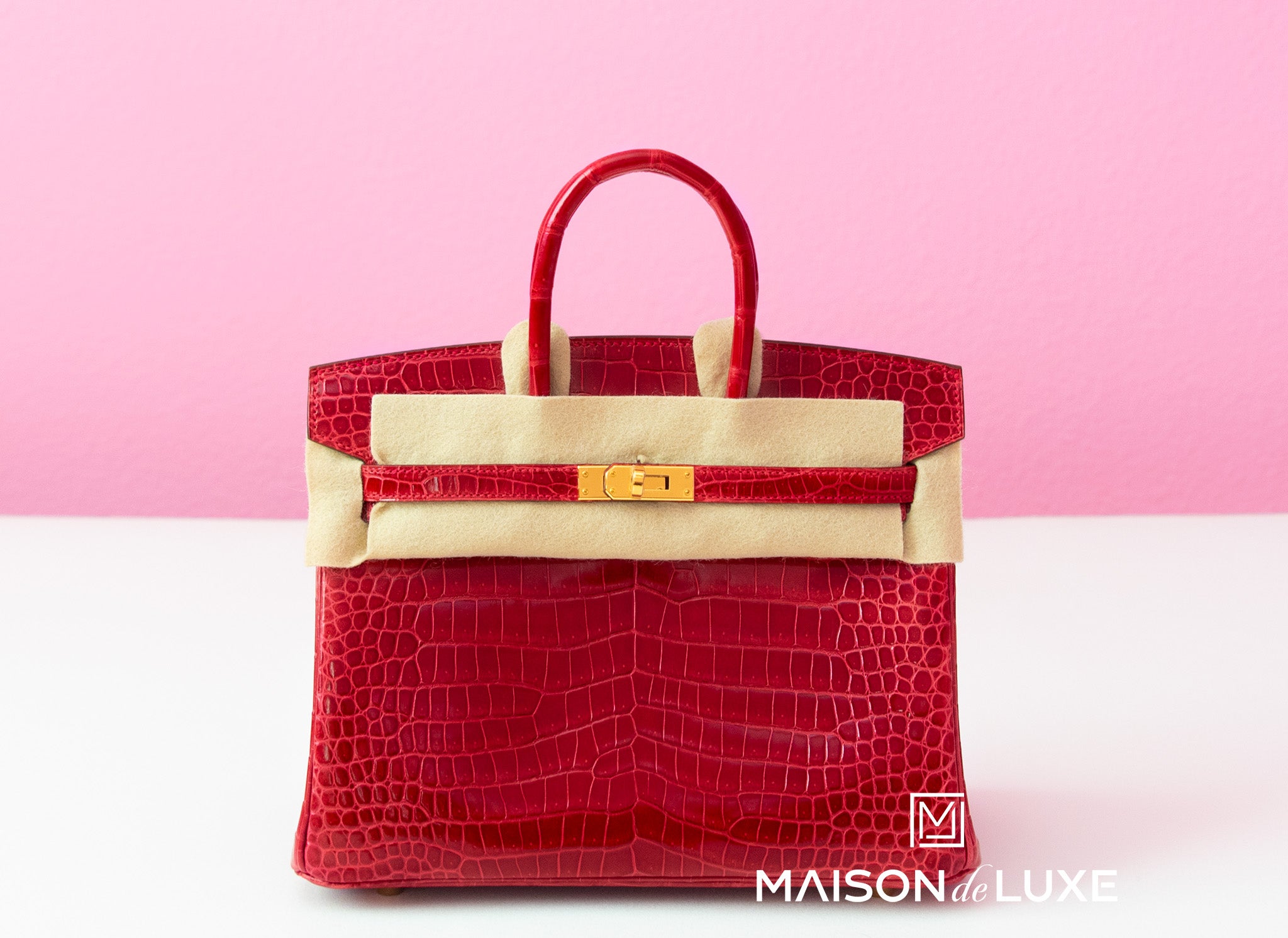 small red birkin bag