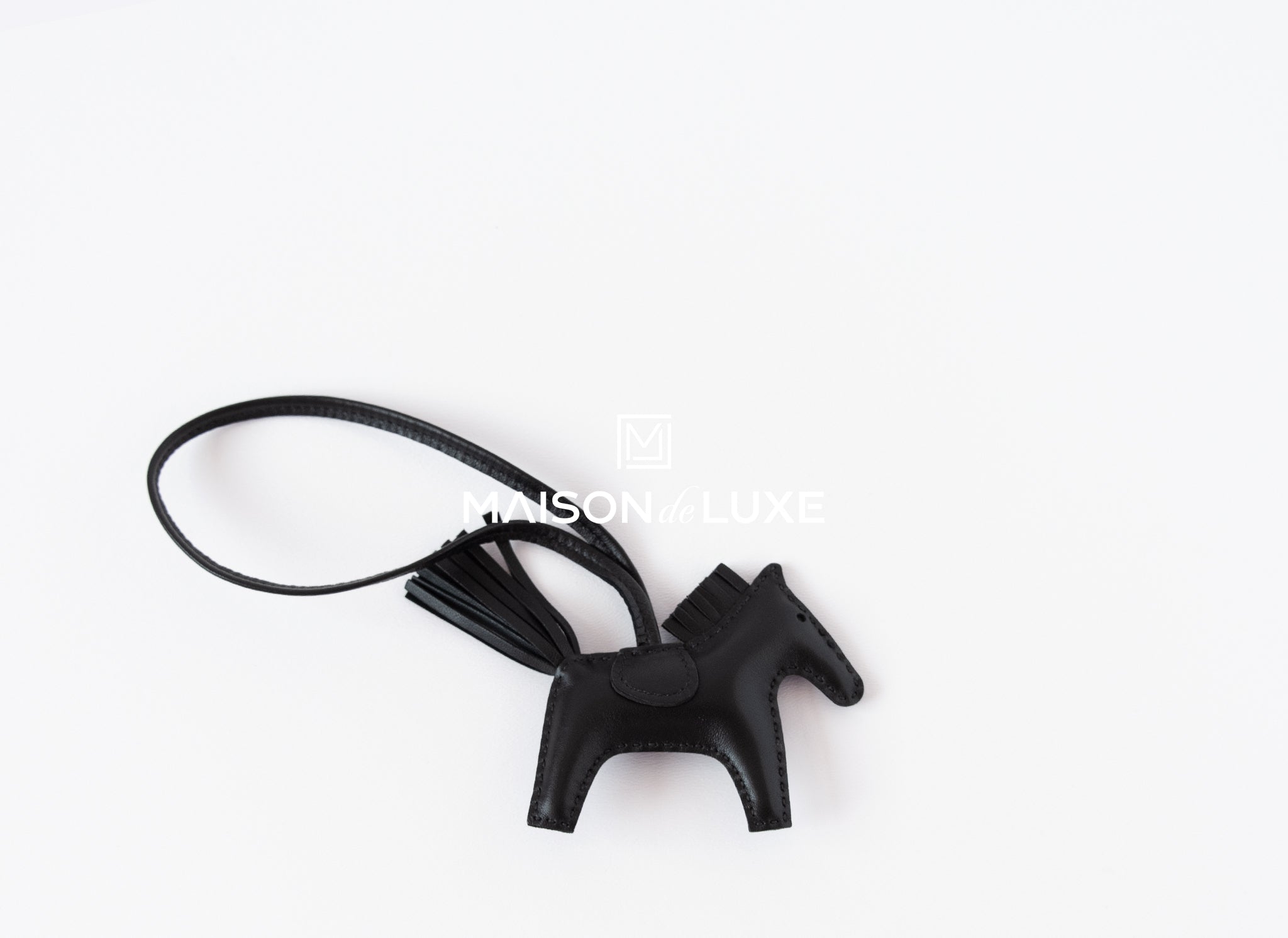 hermes so black rodeo charm