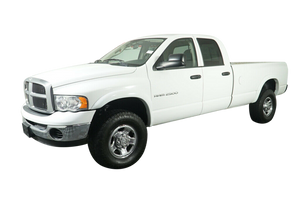 white dodge ram with black fender flares