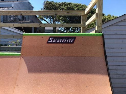 Skatelite ramp surfacing on a Ramptech half pipe ramp for a skate at home park