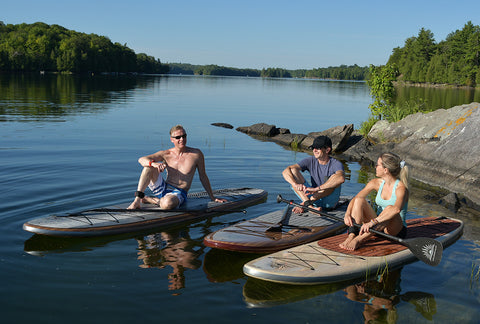 STand up paddle boarders taking a rest