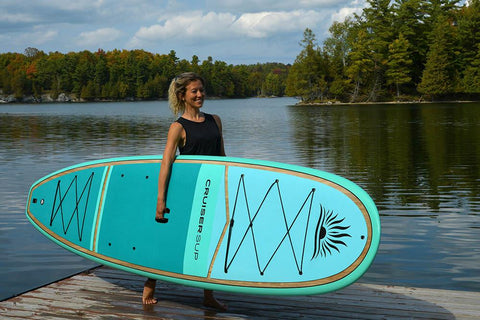 woman and paddle board