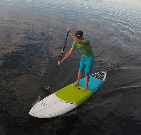 A paddle boarder showing proper form