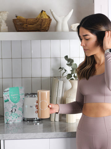 Girl drinking protein smoothie