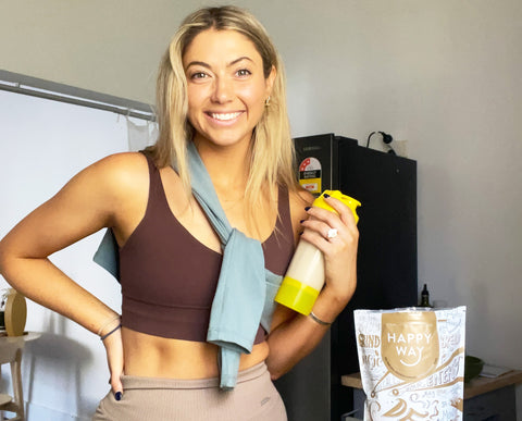 Grace with her favourite Happy Way Whey Protein in Deja Brew Coffee flavour