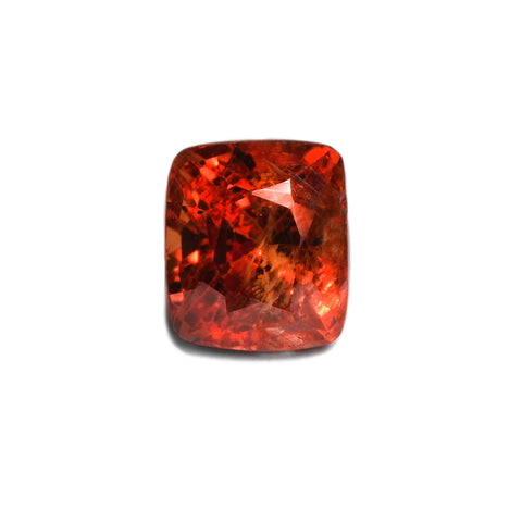 An ornage-red spinel gemstone from Burma, native cut.