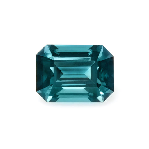 An emerald-cut,  blue-green tourmaline gemstone.