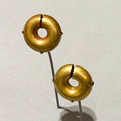 A pair of gold hoop earrings made in ancient Egypt