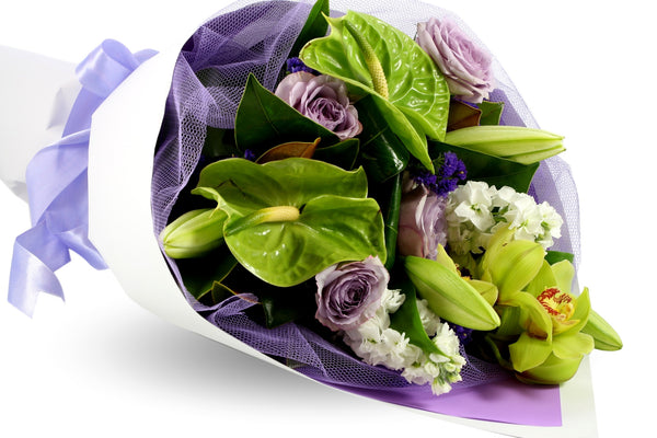 A modern bouquet featuring stunning purple roses