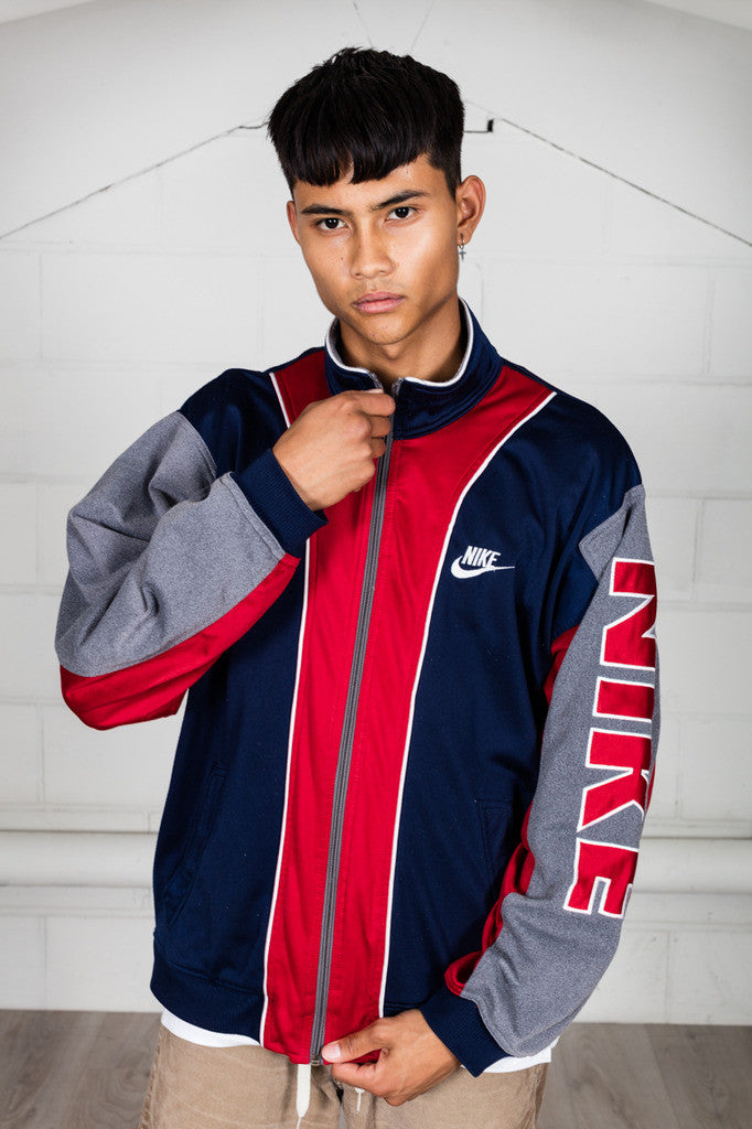 red nike track top