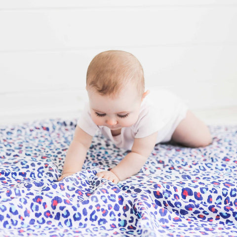 Baby on leopard print muslin by Etta Loves
