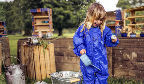 Child Wearing Muddy Puddles Original all-in-one Rainsuit featuring in Little Hot Dog Watsons Blog