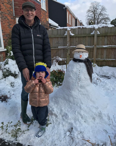 Grandparent and Child. Child wearing Arctic Cub Banana Split Print Little Hotdog Watson Winter Hat