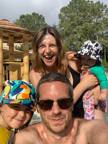 Family of four enjoying time at the pool