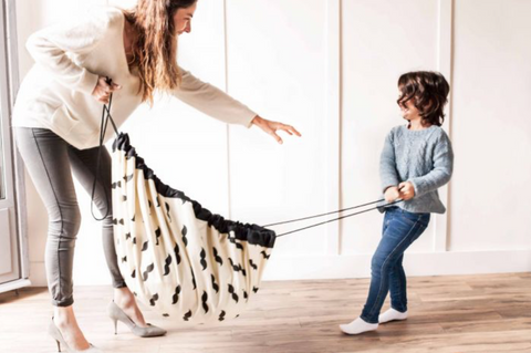 Mother and boy with Play and Go storage bag