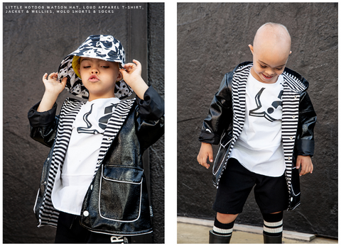 Little Boy wearing all monochrome including panda sun hat
