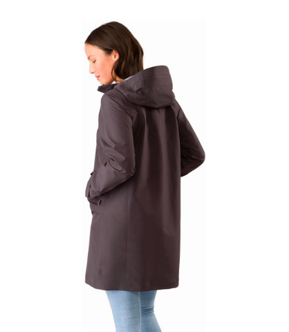 Women wearing high end black rain coat