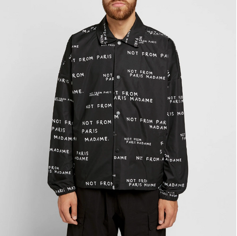 Man wearing printed raincoat