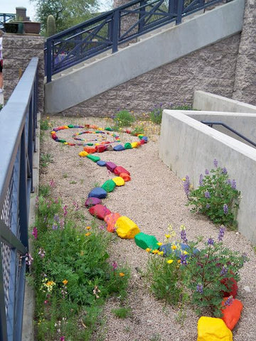 Outdoor creativity with Little Hotdog Watson paint the rocks activity