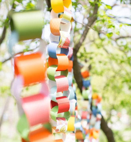 paper chains hanging from tree 