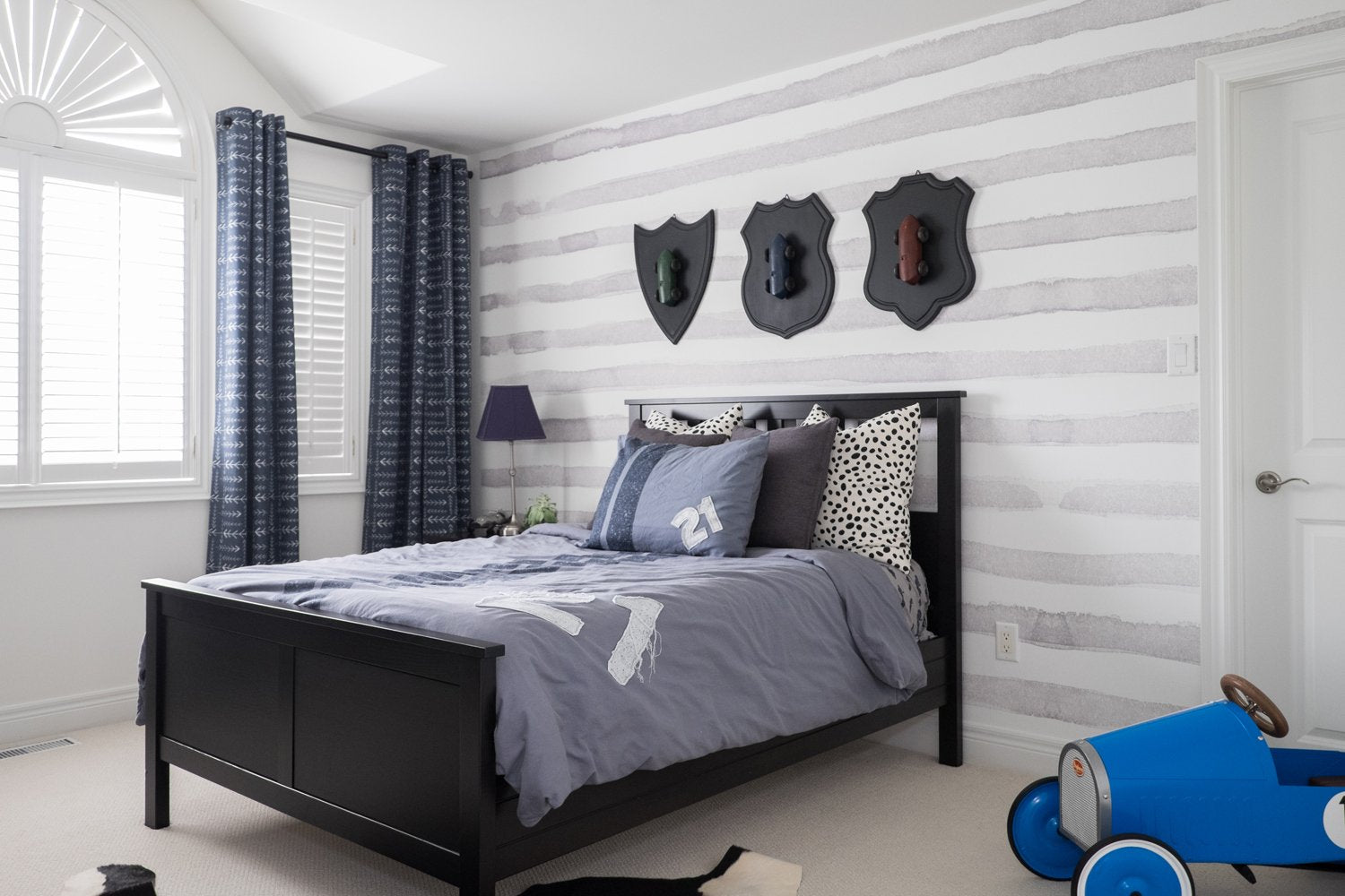 grey striped wallpaper bedroom