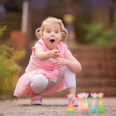 unicorn skittles with girl pointing