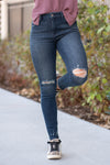Just USA Jeans  Color: Dark Blue Cut: Ankle Skinny, 27" Inseam High Rise, 10" Front Rise   Stitching: Classic 74% COTTON, 14% RAYON, 11% POLYESTER, 1% SPANDEX Fly: Zipper Style #: JP052-DK Contact us for any additional measurements or sizing.  Cas is 5'7", wears a size 25 jeans, small top and 8 shoe. She is wearing a size 4 in these jeans. 