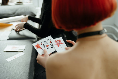 woman holding stickers