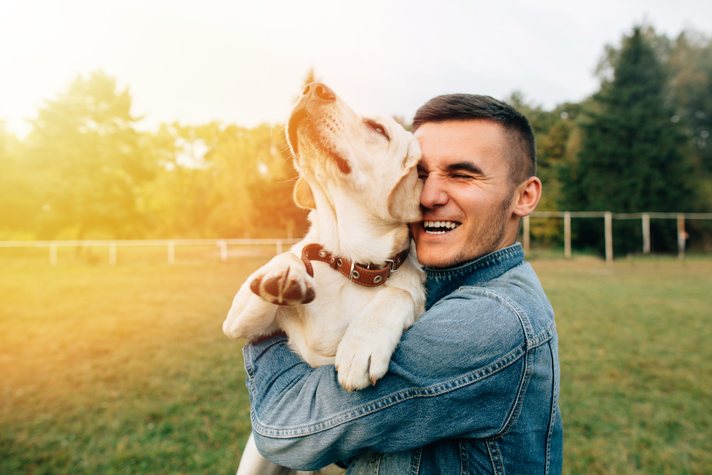 Man hugging his dog