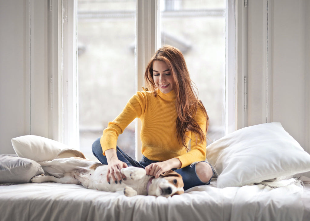 furparent petting her dog