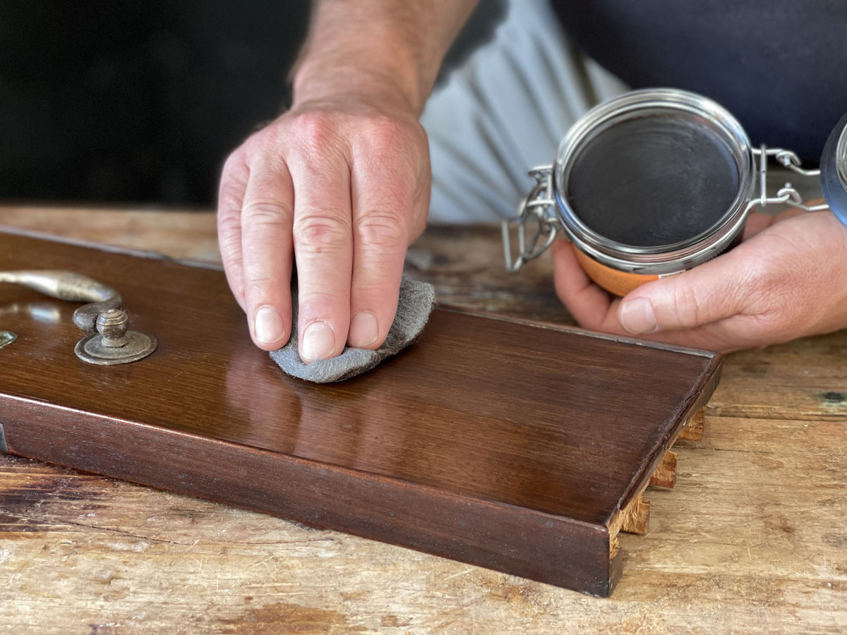 2. Applying rose gold polish to drawer