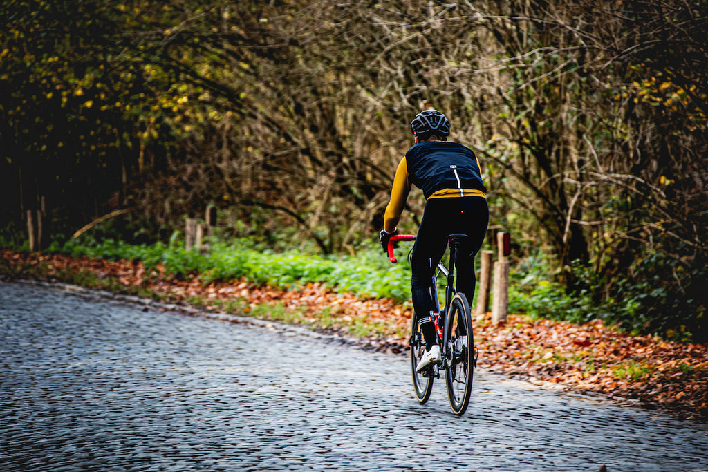 Cycling in Flanders belgian crew apparel cobbles riding
